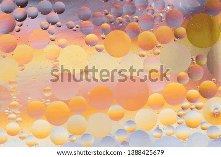 Oil drops in water -  colorful abstract background