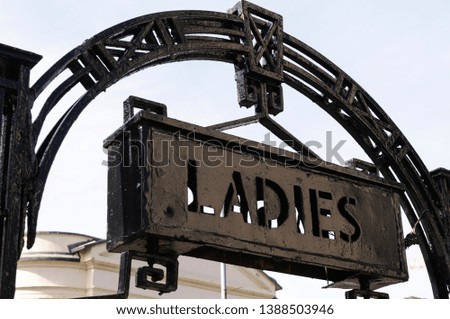 Old fashioned sign to the entrance of a Victorian Ladies toilet