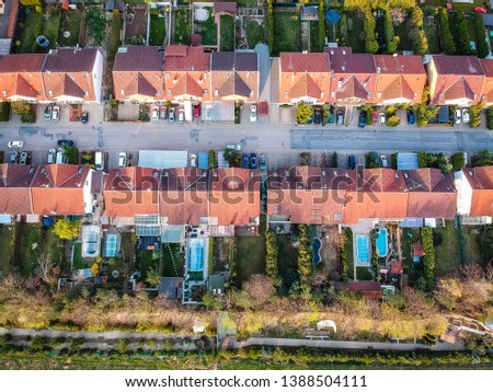 Aerial photo of family row houses with gardens