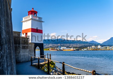 The Lighthouse at Brockton Point on the famous Seawall pathway in Vancouver's Stanley Park 
