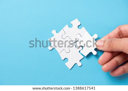 Four pieces puzzle squares diagram for business presentation infographic or marketing strategy.