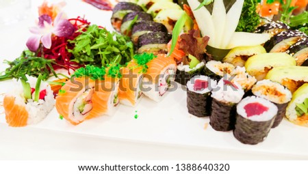 Food, travel and healthy eating concept - Japanese sushi in a restaurant at lunch time, asian cuisine