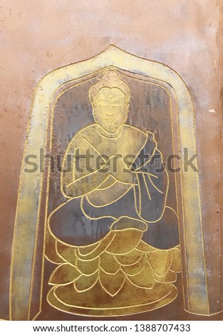 Pattern Buddha carved and painting on wood background.