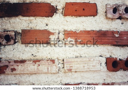 Brown brick walls and white mortar
