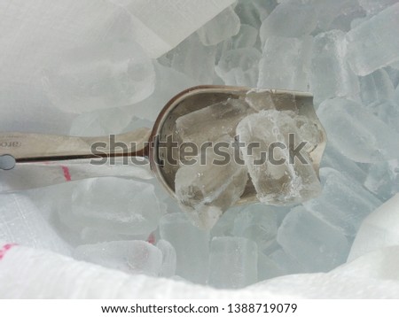 Pieces of crushed ice cubes on  background

