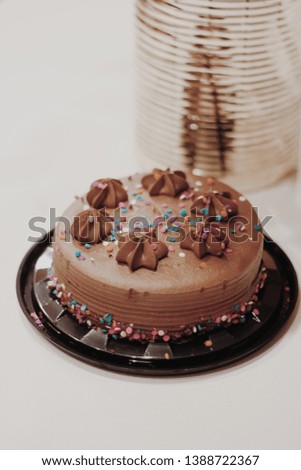 Chocolate birthday cake with sprinkles