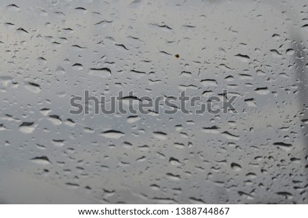 small raindrops on the car windshield