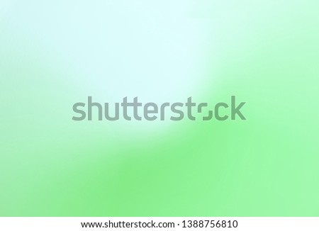 Light green blurred grassy background