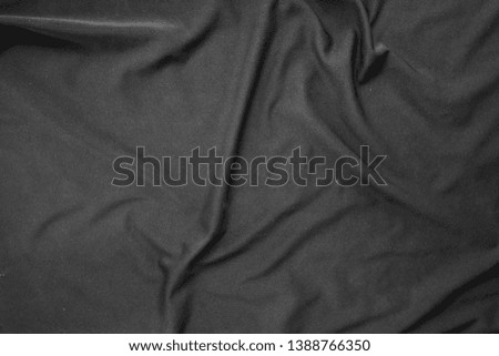 black silk cloth background,old cotton fabric texture,black sportswear shirt