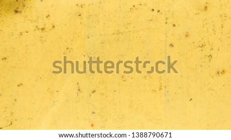 Yellow background with rust. Abstract pattern in retro style. Yellow texture of cracked surface
