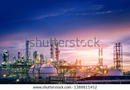 Oil and gas refinery plant or petrochemical industry on sky sunset background, Factory with evening, Manufacturing of petrochemical industrial Royalty-Free Stock Photo #1388811452