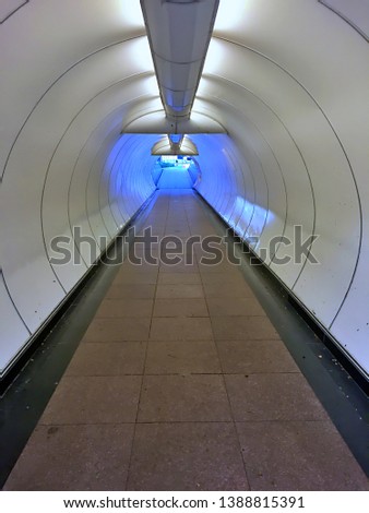 Empty underground walk path on the sunny day