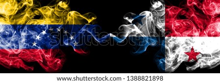 Venezuela vs Panama smoky mystic flags placed side by side. Thick colored silky smoke flags of Venezuela and Panama.