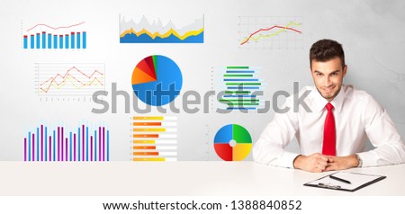 Businessman sitting at desk with financial change, and report making concept