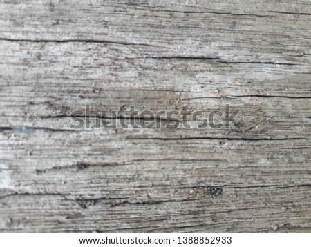 Old brown wood background There are cracks Suitable for making artwork background.