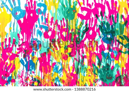 Many hand-colored prints on a white background Colorful hand prints