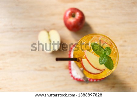 Apple juice on the wooden floor.