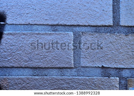 High resolution close up aged and weathered brick walls with red and yellow colored bricks