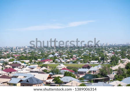 top view of the roofs of houses against the sky