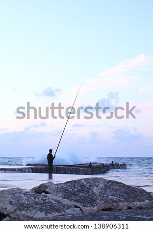 man fishing in the early morning