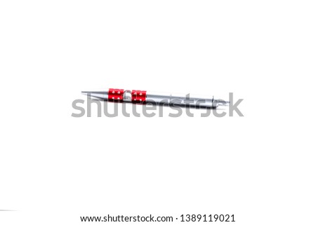 pictured in the photo Gray ball-point pen isolated on the white