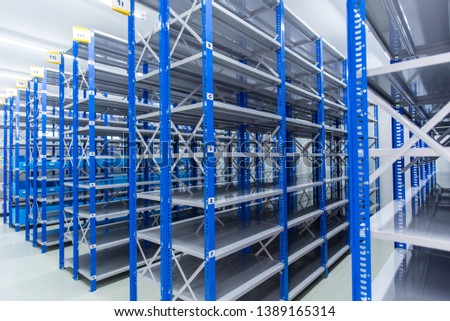 Inside the spare room With shelves prepared for storing auto spare parts, spare room, Factory warehouse spare parts.