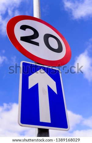 20mph road sign and a one-way system road sign.