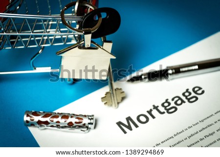 The contract for a mortgage loan. The keys of the property.