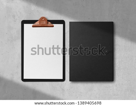 Mock-up. Clipboard with sheets of paper, business cards and folder on concrete background. Template for branding identity. Blank objects for placing your design. 3d illustration.