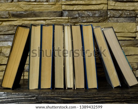books on the bookshelf, the concept of reading and publishing