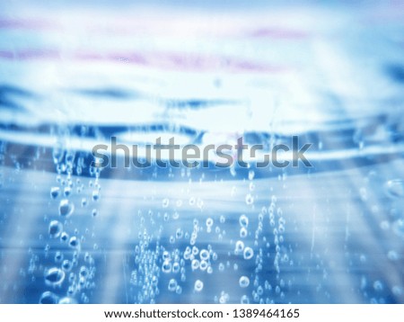Blurry images under the water and the lights that hit the surface Shining and reflecting in deep water with beautiful sparkles - pictures