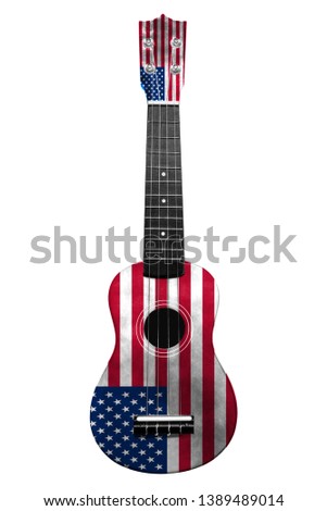Hawaiian national guitar, ukulele, with a painted USA flag, on a white isolated background, as a symbol of folk art or a national song. Vertical frame