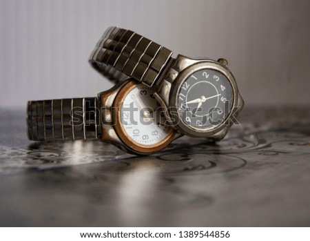 pear of watches in a white background  Royalty-Free Stock Photo #1389544856