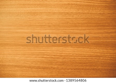 Beautiful glossy wooden wall with texture in dark warm brown and golden tone for interior, background and wallpaper. Cool banner on page, cover, website and presentation