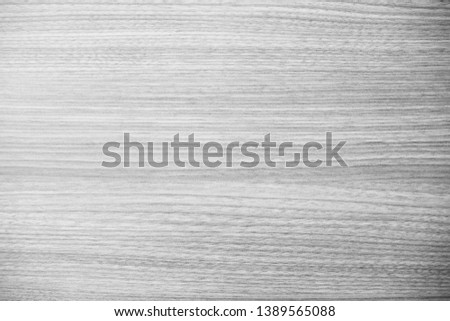 Beautiful glossy wooden wall with texture in black and white, grey tone for interior, background and wallpaper. Cool banner on page, cover, website and presentation. Monochrome seamless modern pattern