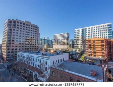 Downtown San Jose cityscape view from San Pedro Market Parking Garage overlooking San Pedro Street and Santa Clara Street.