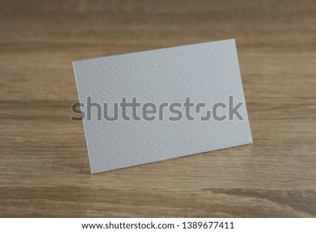 Blank business cards on a wooden background, identity design, corporate templates, company style