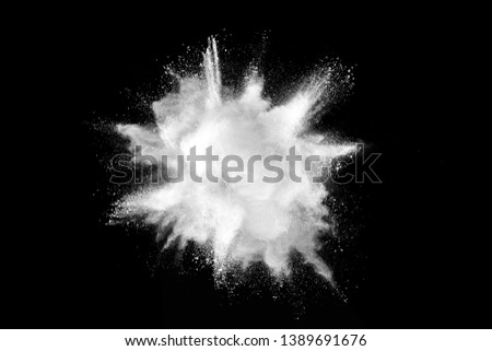 White powder explosion isolated on black background. Royalty-Free Stock Photo #1389691676