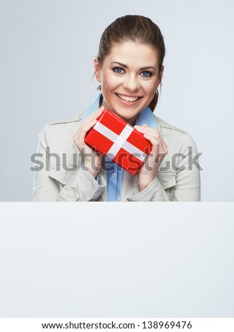 Smiling business woman red gift box hold. 