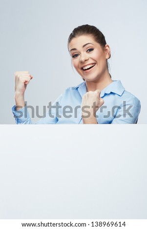 Successfull young business woman portrait out the blank white banner.Female happy model.