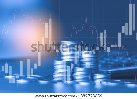 Stack of money coin with trading graph, financial investment concept use for background Royalty-Free Stock Photo #1389723656