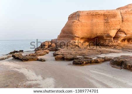 Shuweihat Island seashore beach rocks 