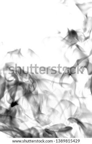 Abstraction of black black smoke on a white background.