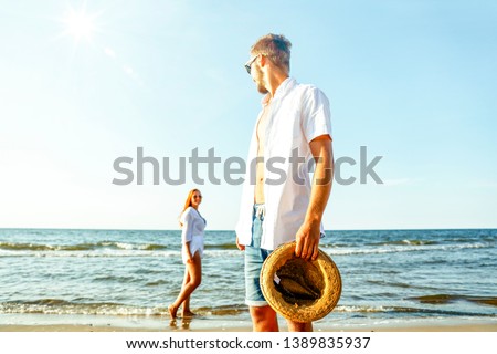 Young people on beach and summer time 