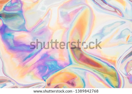 Iridescent holographic background. Multicolor trendy background.