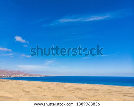 Aerial View of Sand Dunes in Gran Canaria with beautiful coast and beach, Canarian Islands, Spain