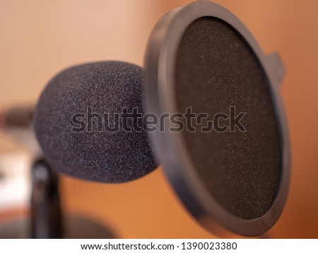 black microphone record in room