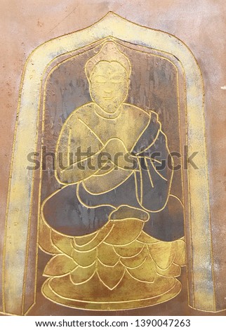 Pattern Buddha carved and painting on wood background.