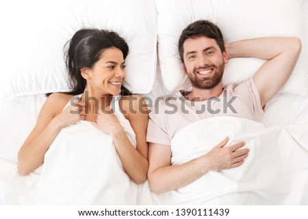 Lovely Couple In Bed Lying In Bedroom Images And Stock