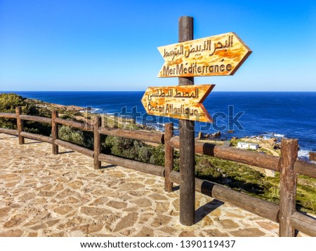 Famous tourist spot in Tangiers, Morocco, represented by a signboard indicating the junction between the Atlantic Ocean and the Mediterranean Sea by the Strait of Gibraltar